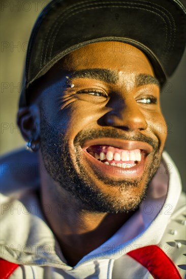 Smiling Black man looking away