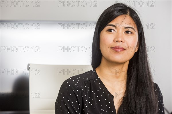 Portrait of serious Asian woman