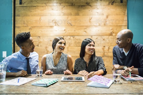 People laughing in meeting