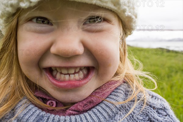 Close up of grinning Caucasian girl