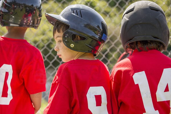 Mixed Race boy playing baseball