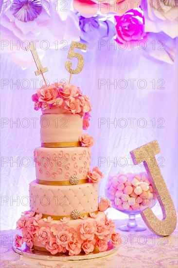 Number 15 on cake near letter J