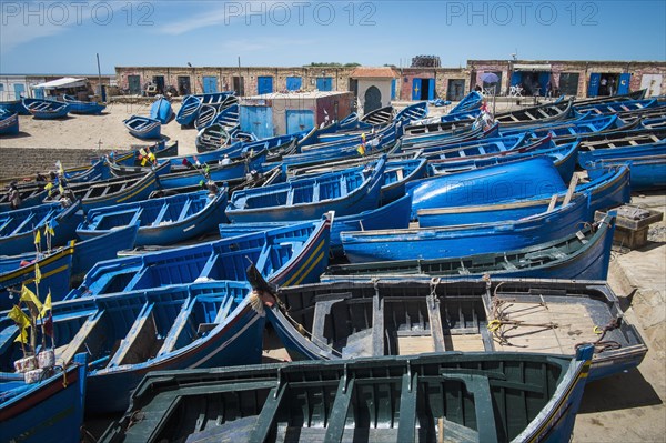 Large group of blue rowboats