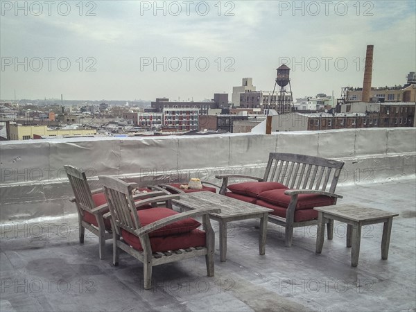 Patio furniture on urban rooftop
