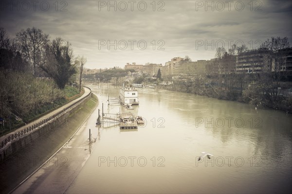 High angle view of still urban canal in city