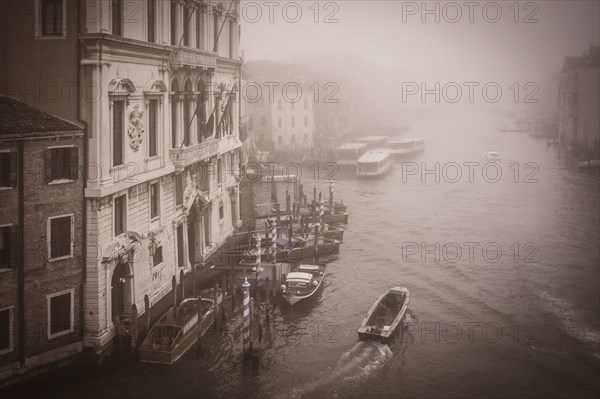 High angle view of boat in urban canal