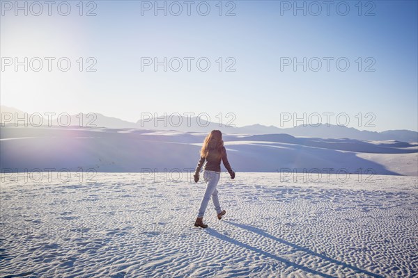 Caucasian woman walking in White Sands National Park