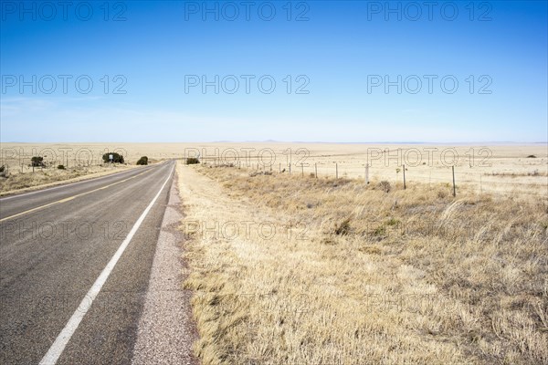 Empty road in rural landscape