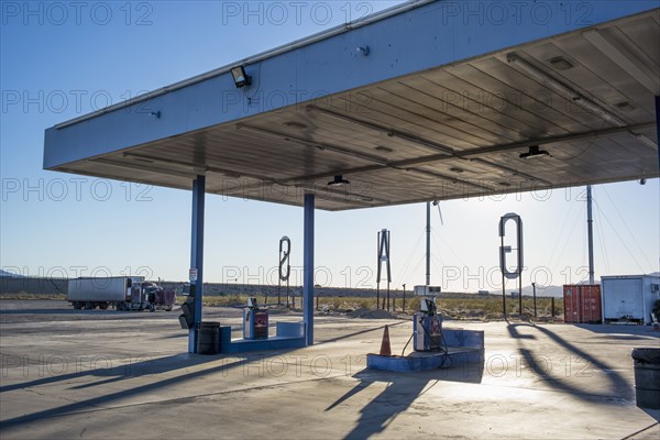 Empty gas station in remote landscape