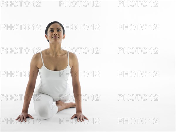 Serene woman practicing yoga