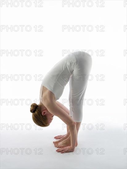 Caucasian woman practicing yoga