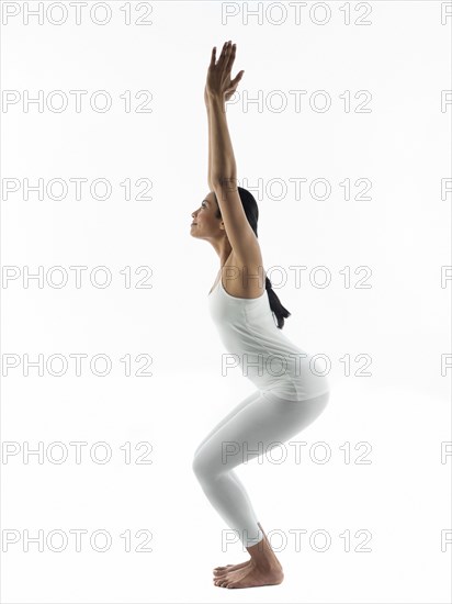 Serene woman practicing yoga