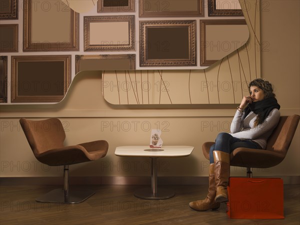 Woman sitting in waiting area