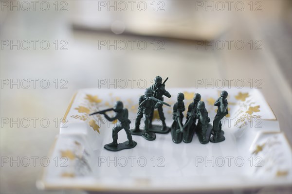 Toy soldiers on antique chair