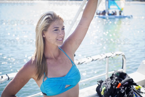 Caucasian diver standing on boat