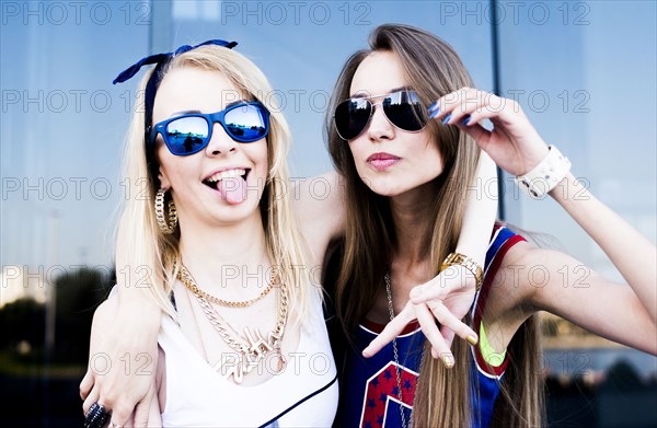 Caucasian women smiling in city