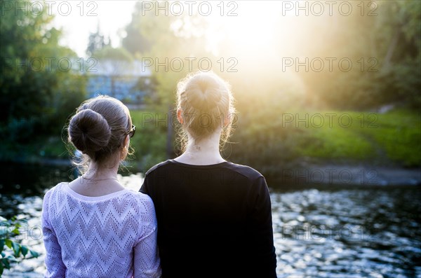 Caucasian women admiring river