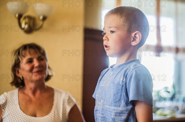 Caucasian mother and son indoors