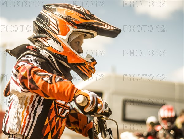 Caucasian motocross biker ready for race