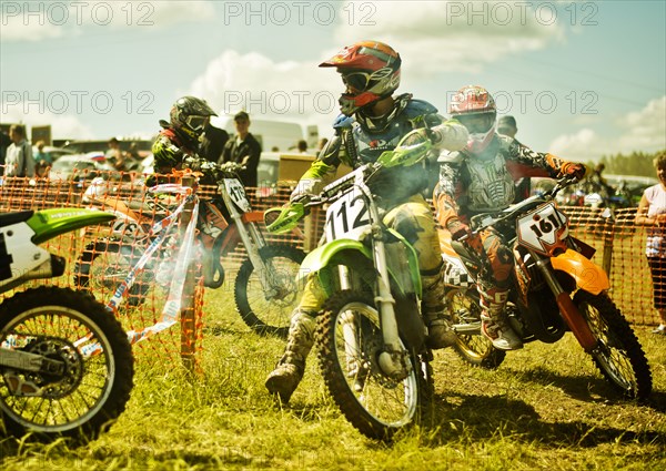 Caucasian motocross biker ready for race