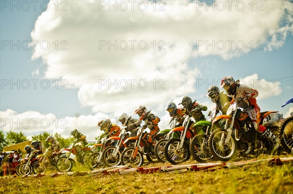 Caucasian motocross bikers ready for race