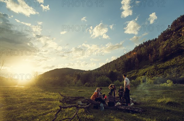 Caucasian friends in rural field