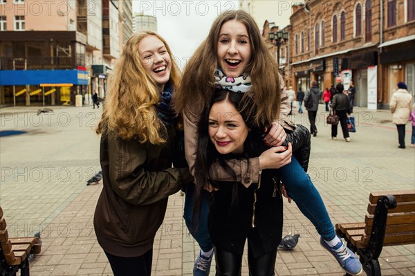 Caucasian women playing outdoors