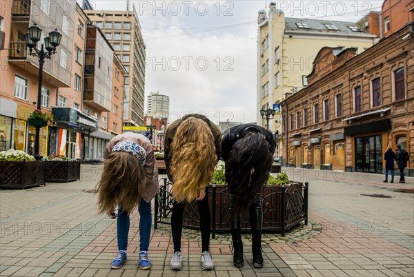 Caucasian women posing outdoors