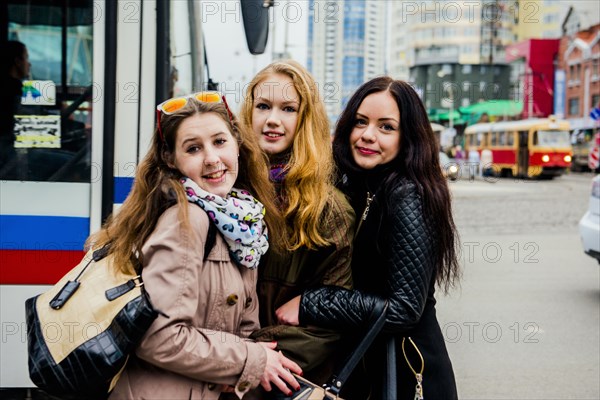 Caucasian women hugging outdoors