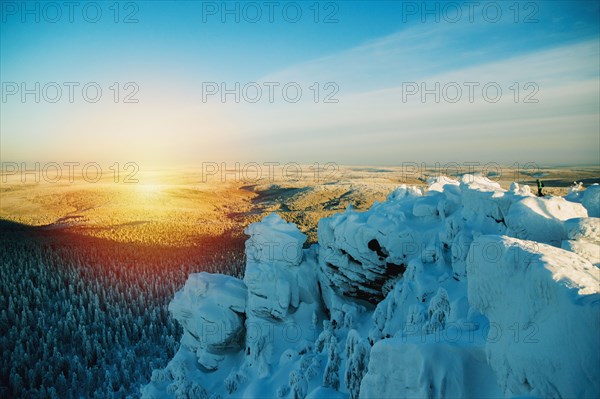 Snowy hilltop overlooking remote landscape