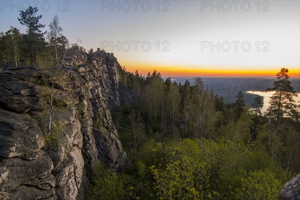 Sunset over mountain rocks