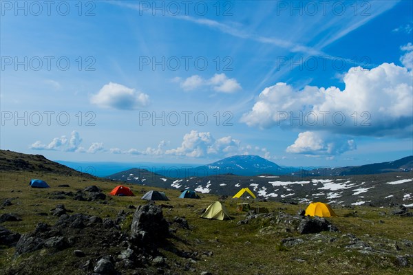 Camping tents in mountain landscape