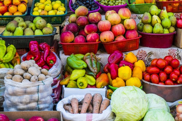 Variety of fresh fruit and vegetables at market