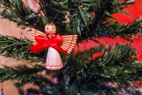 Angel ornament on Christmas tree