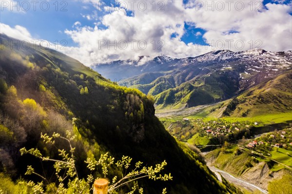 Clouds over village in valley