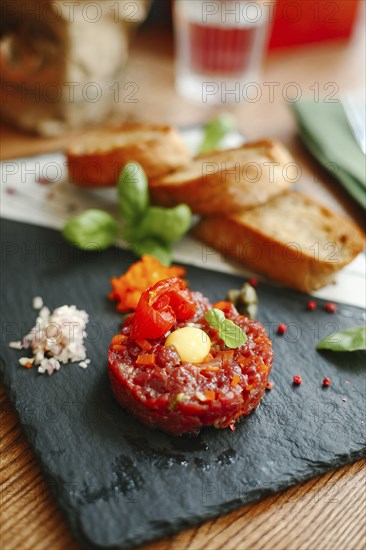 Gourmet appetizer on slate with bread
