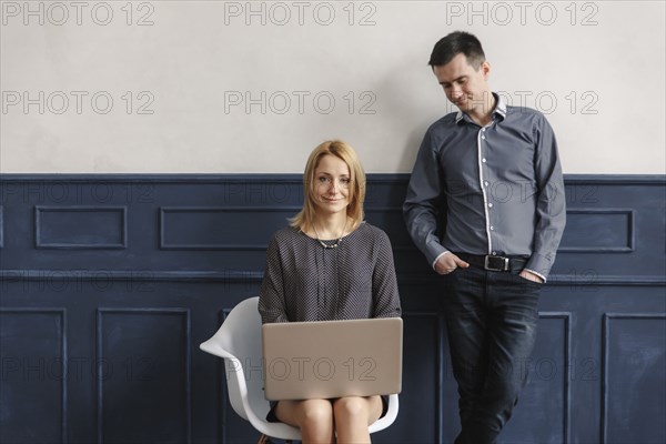 Middle Eastern couple using laptop