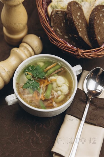 Cup of soup with bread