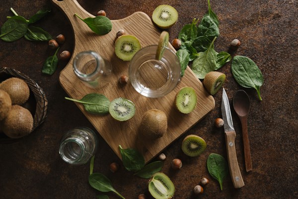 Sliced kiwi on cutting board