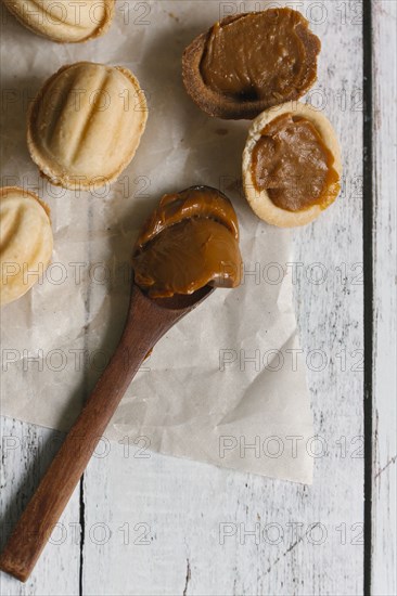 Wooden spoon with filling for cookies