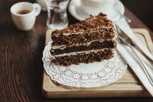 Slice of layer cake on doily