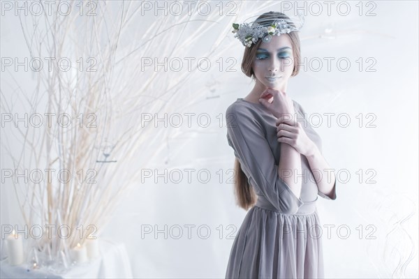 Ethereal woman wearing dress and makeup