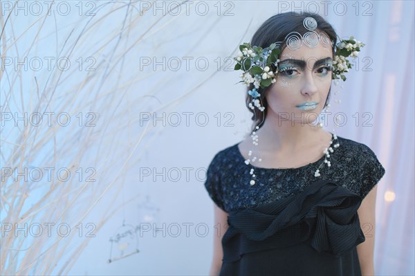 Ethereal woman wearing dress and makeup