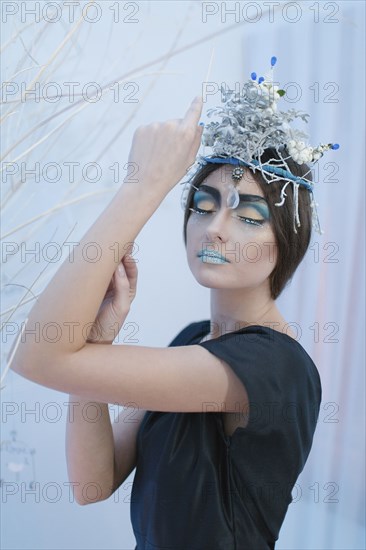 Ethereal woman wearing dress and makeup