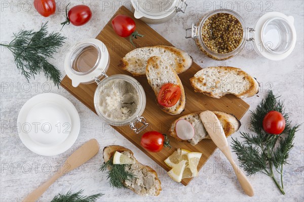 Liver paste and bread on cutting board