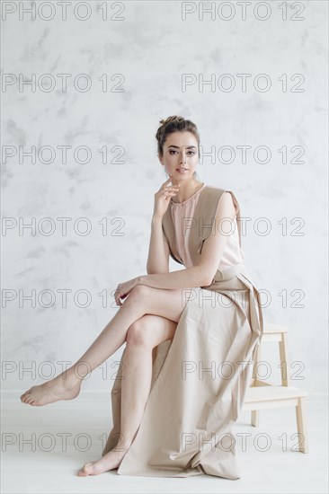 Portrait of glamorous barefoot Middle Eastern woman