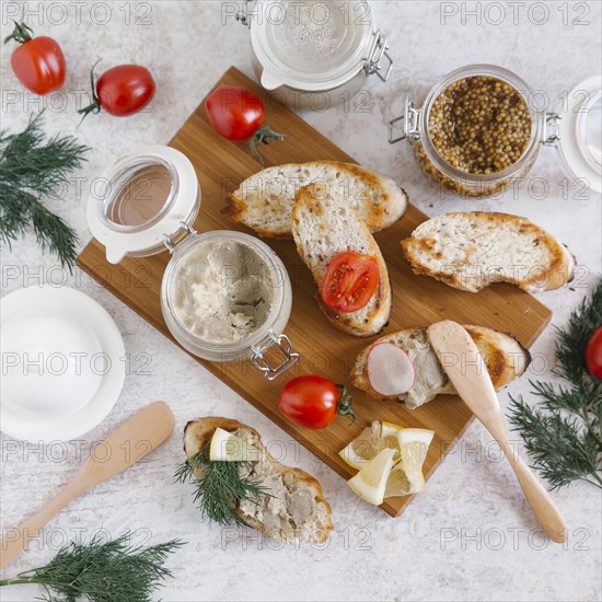 Liver paste and sliced bread on cutting board