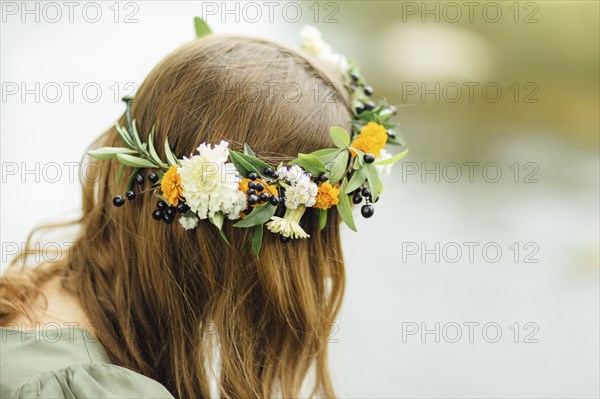 Close up of Middle Eastern woman wearing flower crown