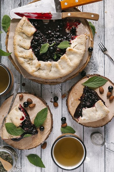 Blueberry pie on wooden table