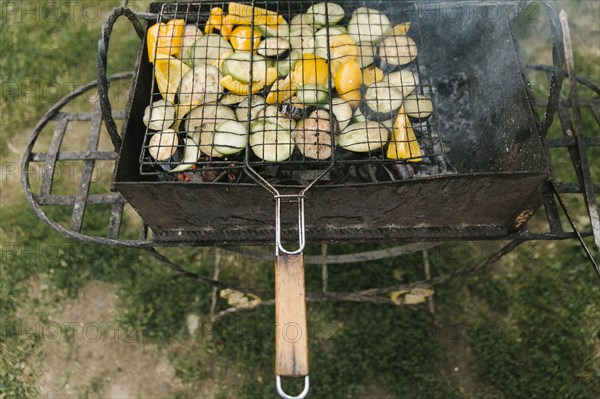 Vegetables cooking on grill